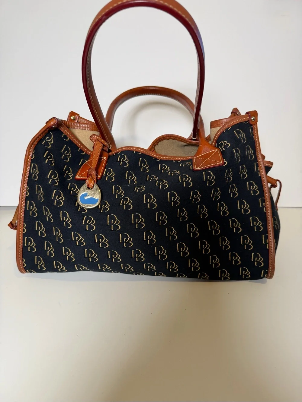 Dooney & Bourke Black Monogram Satchel with Brown Leather Trim